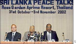 Prof. G. L. Peiris and Anton Balasingham jointly address the press during the Sri Lanka peace talks.