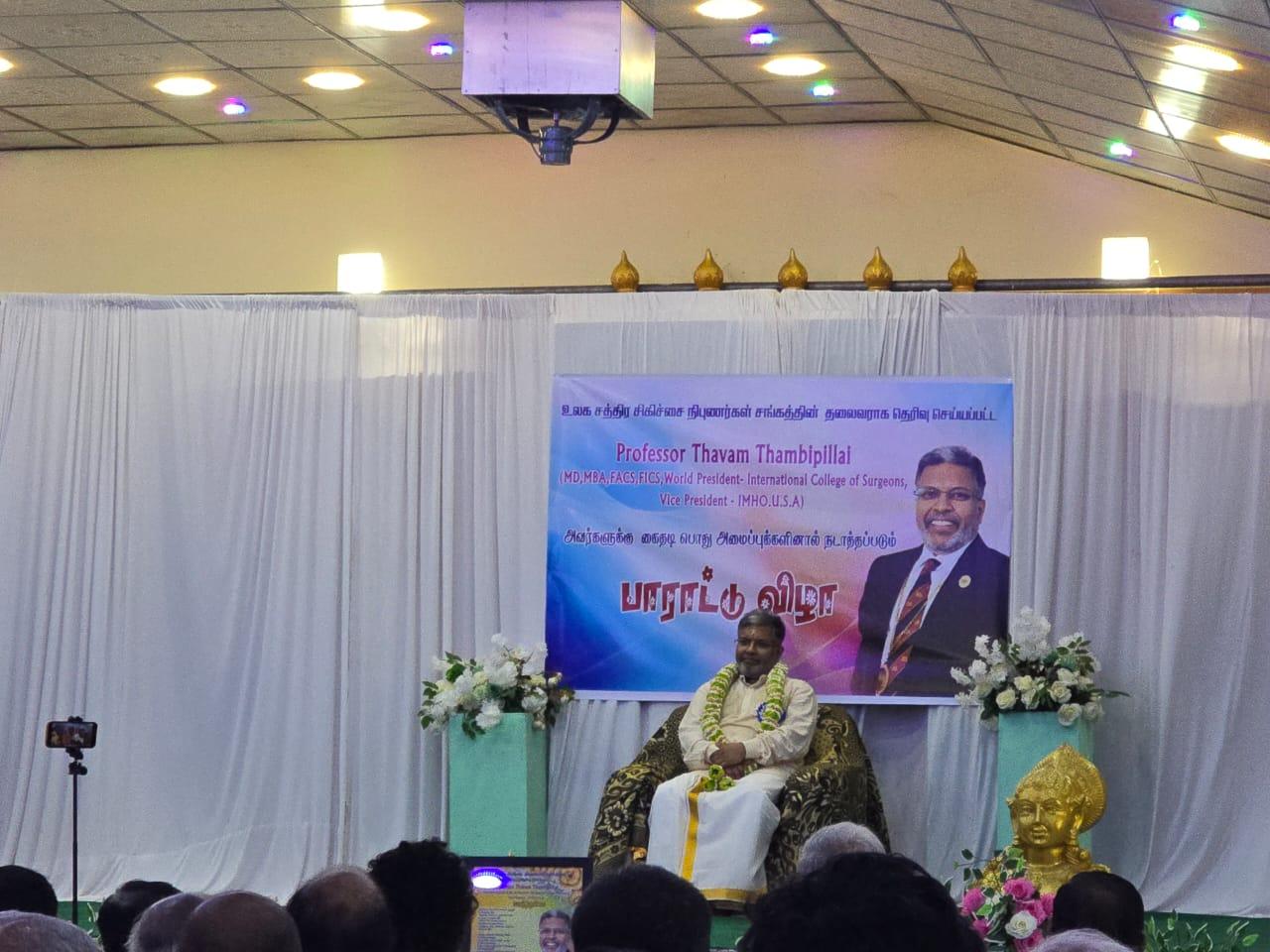 Prof. Thavam Thambipillai sits on stage during a felicitation ceremony held in his honour in Jaffna on Sunday.
