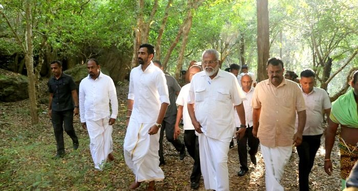 Douglas Devananda at the disputed Vedukkunari Hill site in Vavuniya during his tenure as a cabinet minister.
