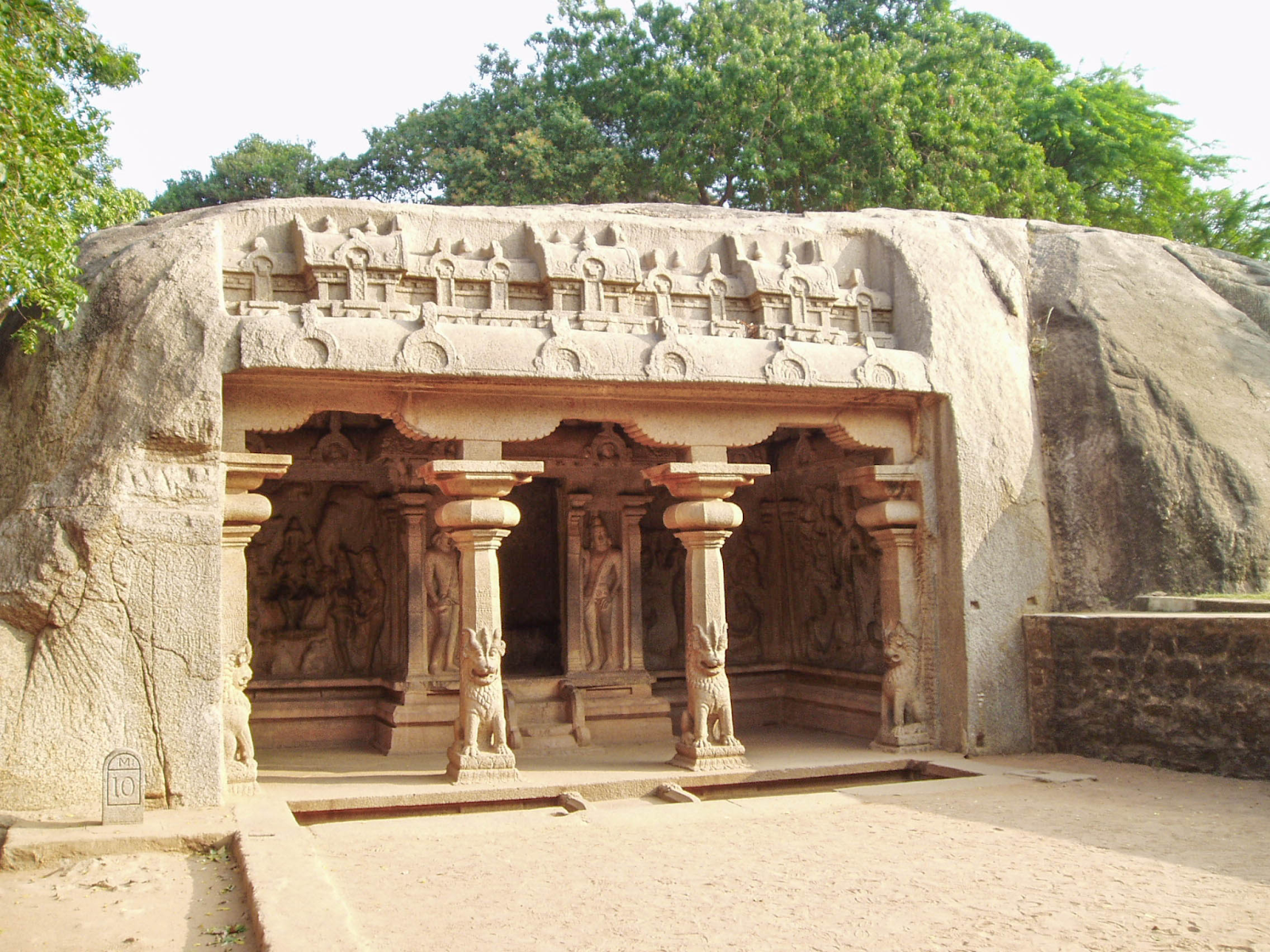 The Varaha Cave Temple, a rock-cut shrine at Mamallapuram on India’s Coromandel Coast, reflects the architectural innovations of the Pallava era, when South Indian artistic traditions began to travel across the seas to Southeast Asia.